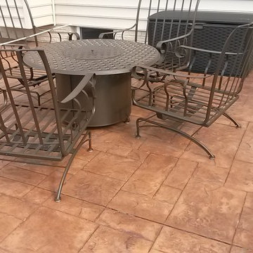 Stamped concrete, terra cotta color, ashlar slate stamp pattern