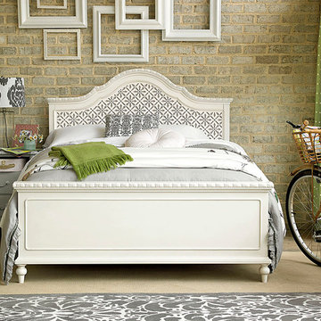 Neutral Loft Style Bedroom with Brick Walls and Painted Bed