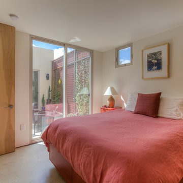 Master bedroom has sliding doors to central courtyard