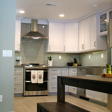 Dining and Kitchen have become one space, unified by the new floor