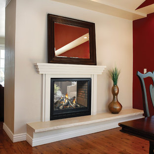 75 Beautiful Red Dining Room With A Wood Fireplace Surround