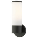 Livex Lighting - Black Contemporary, Minimal, Urban, Clean Single Sconce - Add a dash of character and radiance to your home with this wall sconce. This single-light fixture from the Lindale Collection features a black finish with a satin opal white glass. The clean lines of the back plate complement the cylindrical glass shade adorned with detailed trim on top creating a minimal, sleek, urban look that works well in most decors. This fixture adds upscale charm and contemporary aesthetics to your home.