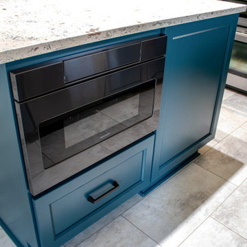 Two Tone Teal and Cream Kitchen with Romano White Quartz Countertop