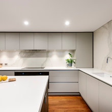 Kitchen grey or white cabinets & white bench