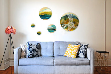 Round original art over couch by April Lacheur