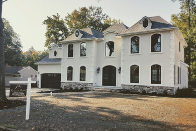 Example of a transitional exterior home design in New York
