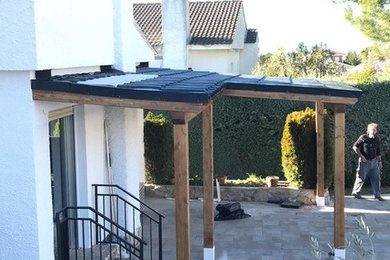 Imagen de terraza campestre con pérgola