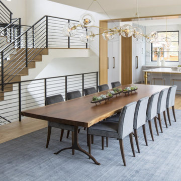 Large walnut dining table with three wishbone legs