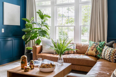 Family room - traditional family room idea in Boston with blue walls