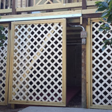 Take a Look at this Sliding Lattice Door for Under Deck Storage