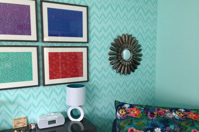 Eclectic bedroom photo in Grand Rapids with blue walls