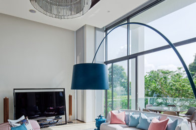 Design ideas for a family room in Singapore.