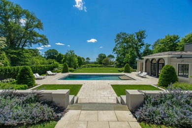 Inspiration for a huge traditional stone landscaping in Boston.