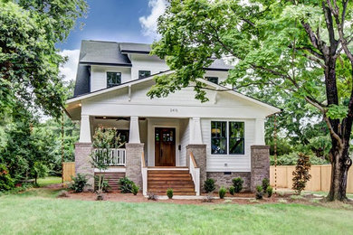 Example of an arts and crafts exterior home design in Charlotte