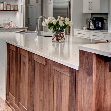 White Painted Cabinetry with Walnut island