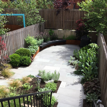Modern Garden with Curved Corten Border
