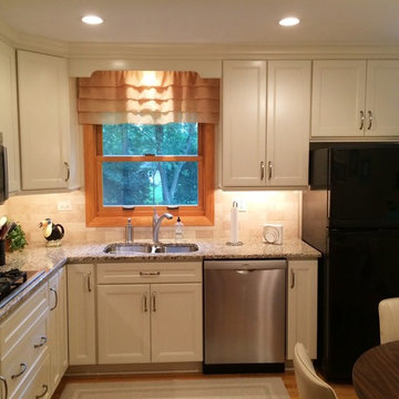 Small White "L" Shaped Kitchen in Naperville by Adam Hartig AKBD