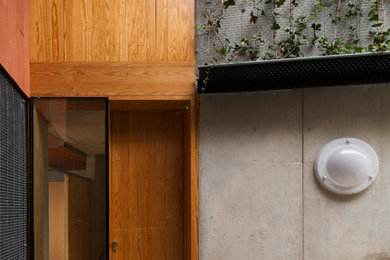 Example of a trendy entryway design in Barcelona