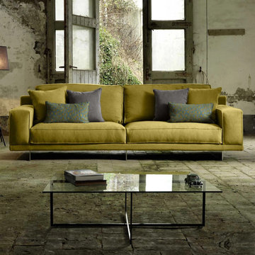 The particular sofa is designed and made in Italy and it is given a contemporary