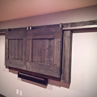 Design ideas for a medium sized industrial basement in DC Metro with medium hardwood flooring.