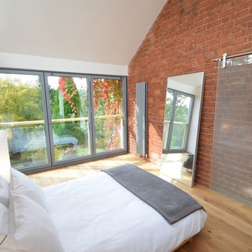 Glass balcony and oak wood cladding extension, Stroud, Cotswolds, Gloucestershir