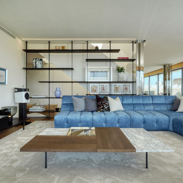 Living Room with Blue Sofa, Metal Shelving and TV Wall, Lisbon