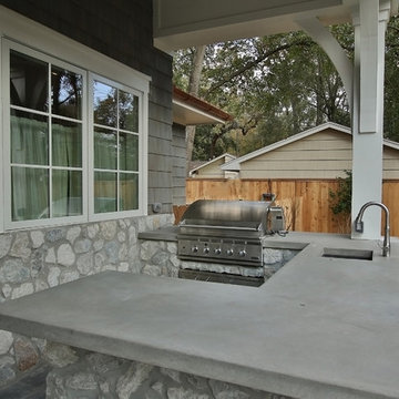 Stone and Cedar Shake come together for this Southern Living Style home