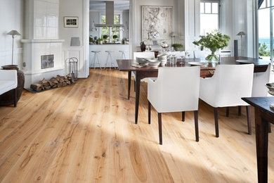Inspiration for a mid-sized timeless open concept light wood floor living room remodel in Boston with white walls, a standard fireplace and a tile fireplace