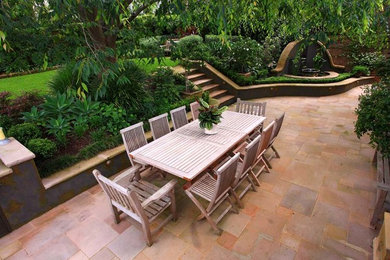 Design ideas for a large backyard patio in Sydney.