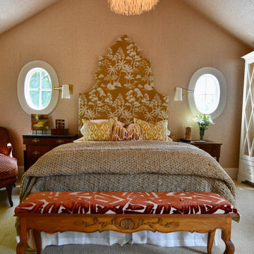 The custom headboard adds huge impact to this relaxing space!