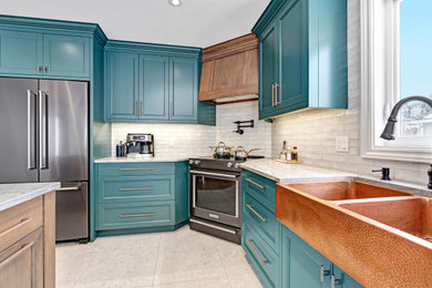Eat-in kitchen - large traditional l-shaped porcelain tile and white floor eat-in kitchen idea in Ottawa with a farmhouse sink, recessed-panel cabinets, green cabinets, quartzite countertops, white backsplash, porcelain backsplash, black appliances, an island and gray countertops