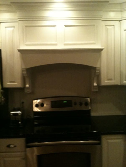 designed and built range hood mantle need a critical eye