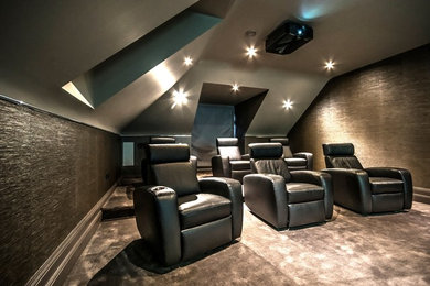 This is an example of a contemporary home theatre in Surrey.