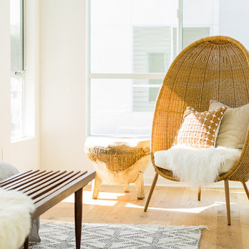 Modern Egg-shaped Wicker Chair with Sheepskin