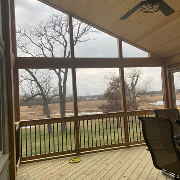 Screen Porch with Cathedral Ceiling, cedar rails, & shed roof in Lake Barrington