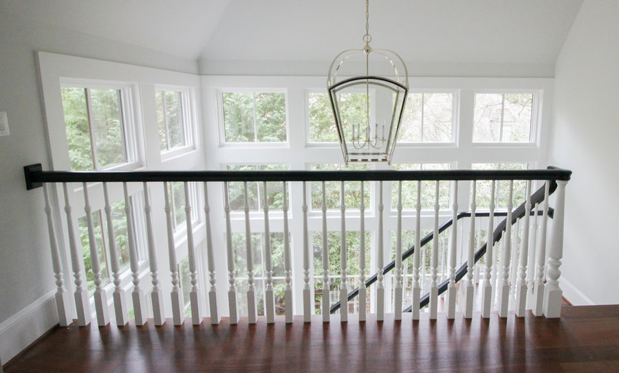 Powerful Impression by Floating Staircase in Suburban Foyer