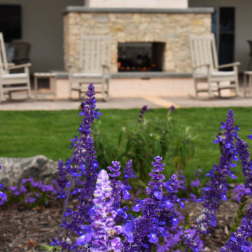 Coastal Cottage with Natural Stone Wall and Rustic Brick Pathways