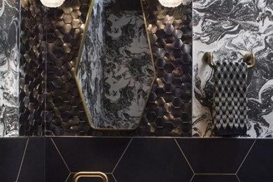 Powder room - small eclectic black tile and mosaic tile wallpaper powder room idea in Denver with black cabinets, black walls and a floating vanity