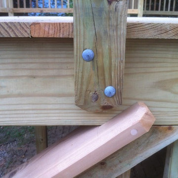 Presure treated deck with cedar cap rail and, privacy lattice