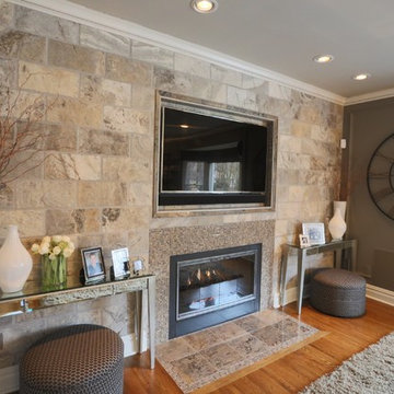 Stone Tile Wall Living Room with Embedded TV and Fireplace