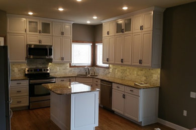 Example of a classic kitchen design in Other
