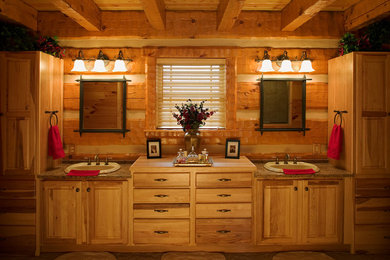 Example of a large farmhouse master ceramic tile ceramic tile bathroom design in Charlotte with a drop-in sink, raised-panel cabinets, medium tone wood cabinets and granite countertops