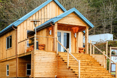 Example of a beach style shed design in Other