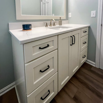 Powder Room with Custom White Vanity and Laventa Snow Quartz Countertop