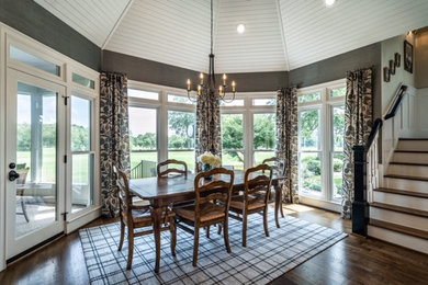 Example of a transitional dining room design in Raleigh
