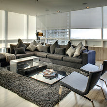 SALA DE ESTAR SOFÁ CINZA