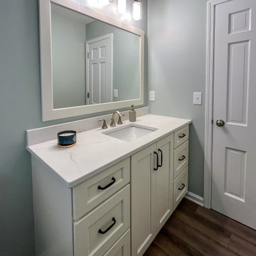 Powder Room with Custom White Vanity and Laventa Snow Quartz Countertop