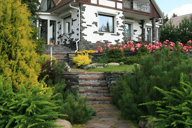 Foto de jardín de tamaño medio en verano con adoquines de piedra natural