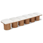 Meridian Furniture - Pavilion Black Boucle Fabric Bench, Cream, Walnut Brown Finish, 108" W X 15.5" D X 17.5" H - Bring valuable seating and remarkable style to your space with this cream Pavilion boucle fabric bench, an exquisite balance of style and usability for the entryway, bedroom, and beyond. Crafted from oak veneer with a walnut brown finish, this bench has a 4-inch-thick seat cushion that's channel-tufted for a touch of luxury. The bench's columnar bases add a dash of art deco design, making it a captivating focal point in any room.