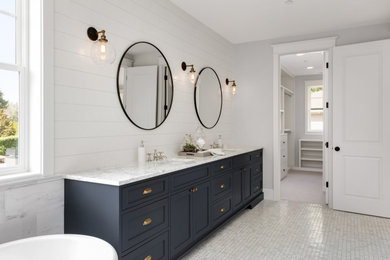 Inspiration for a large transitional master gray floor bathroom remodel in Houston with shaker cabinets, blue cabinets, white walls, an undermount sink and gray countertops